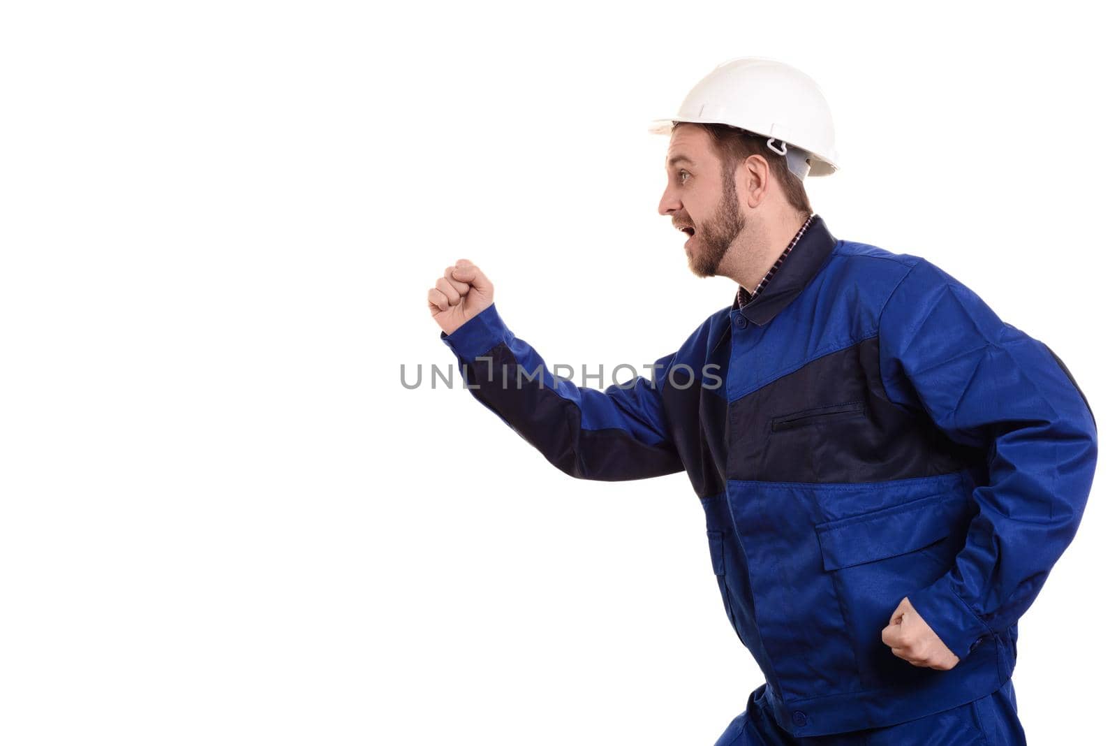 man builder in hard hat and overalls runs for construction isolated on the white background.