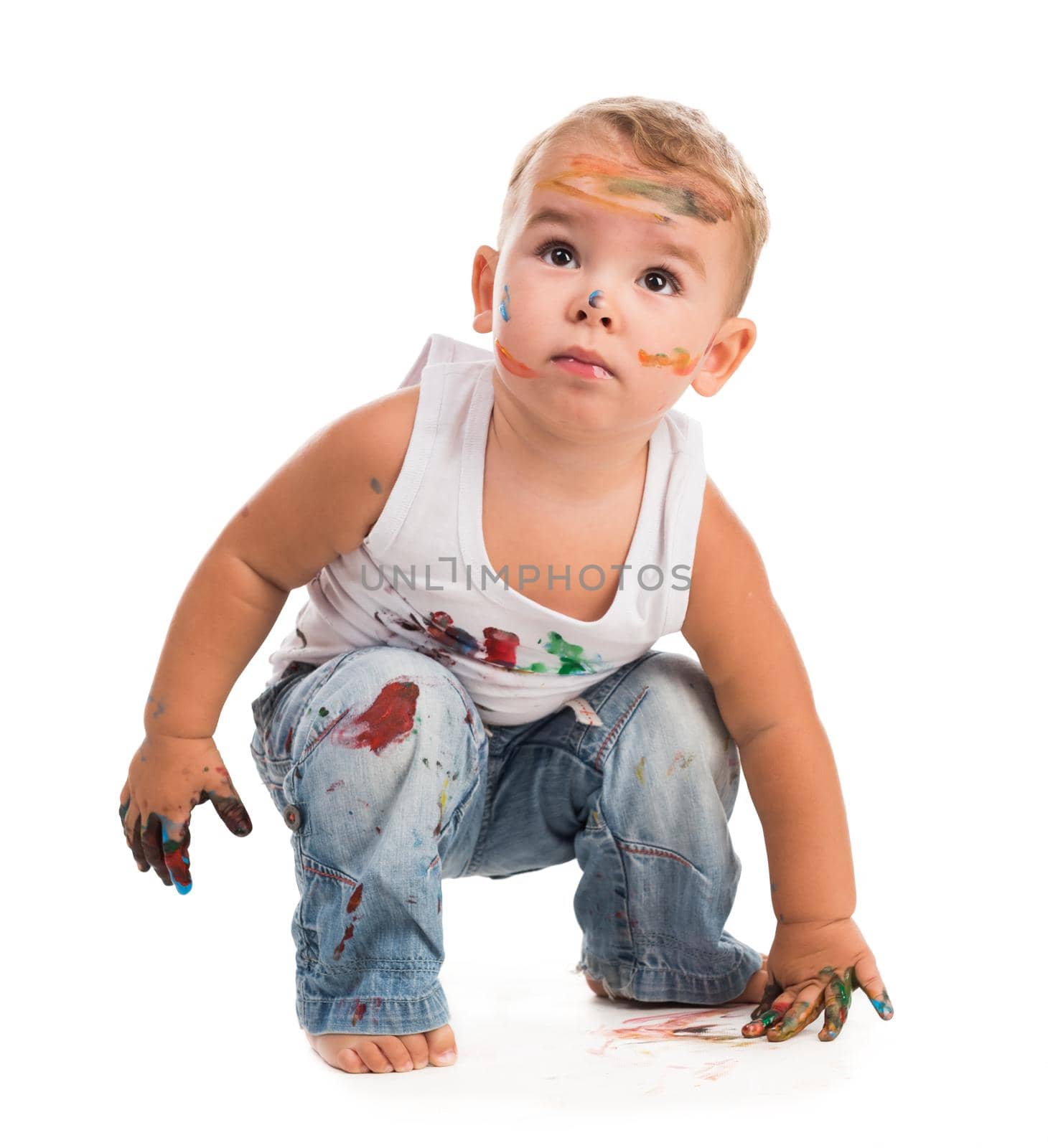 little boy painted with colors isolated on white background