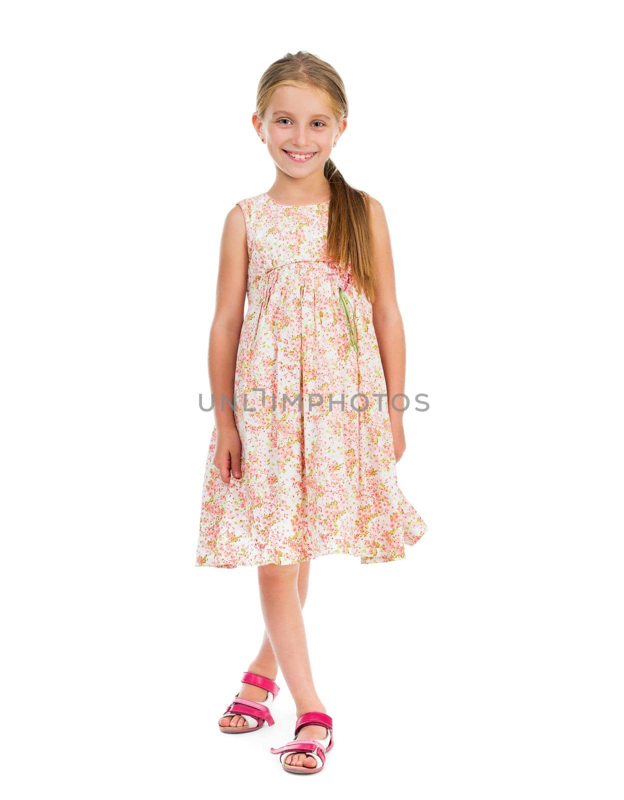 beautiful little girl in dress isolated on white background