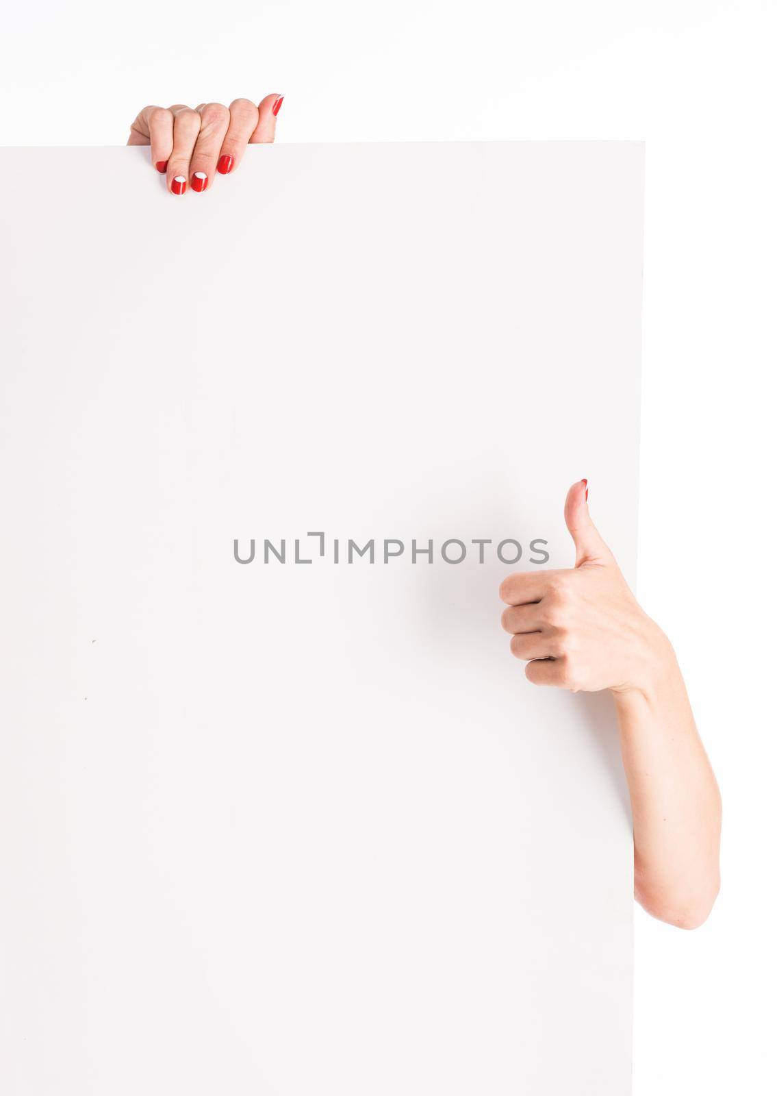 hands holding big blank paper with thumb up by GekaSkr