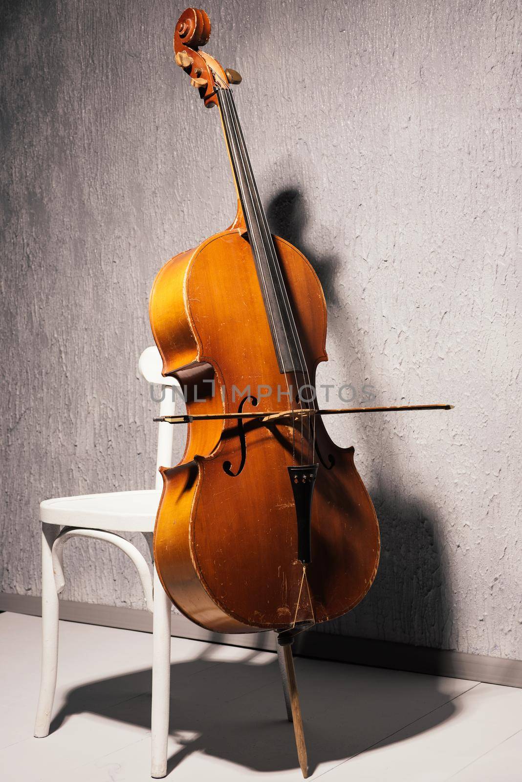 Violin on chair at school or practice room ,During the practice break time to prepare For the concert.
