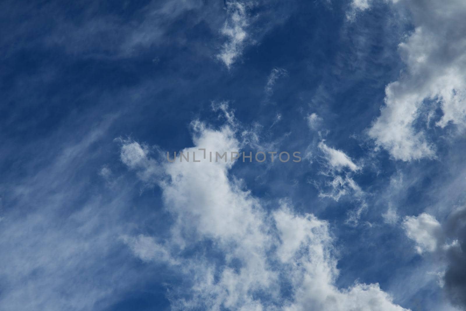 Beautiful fluffy white clouds against the blue sky - Image