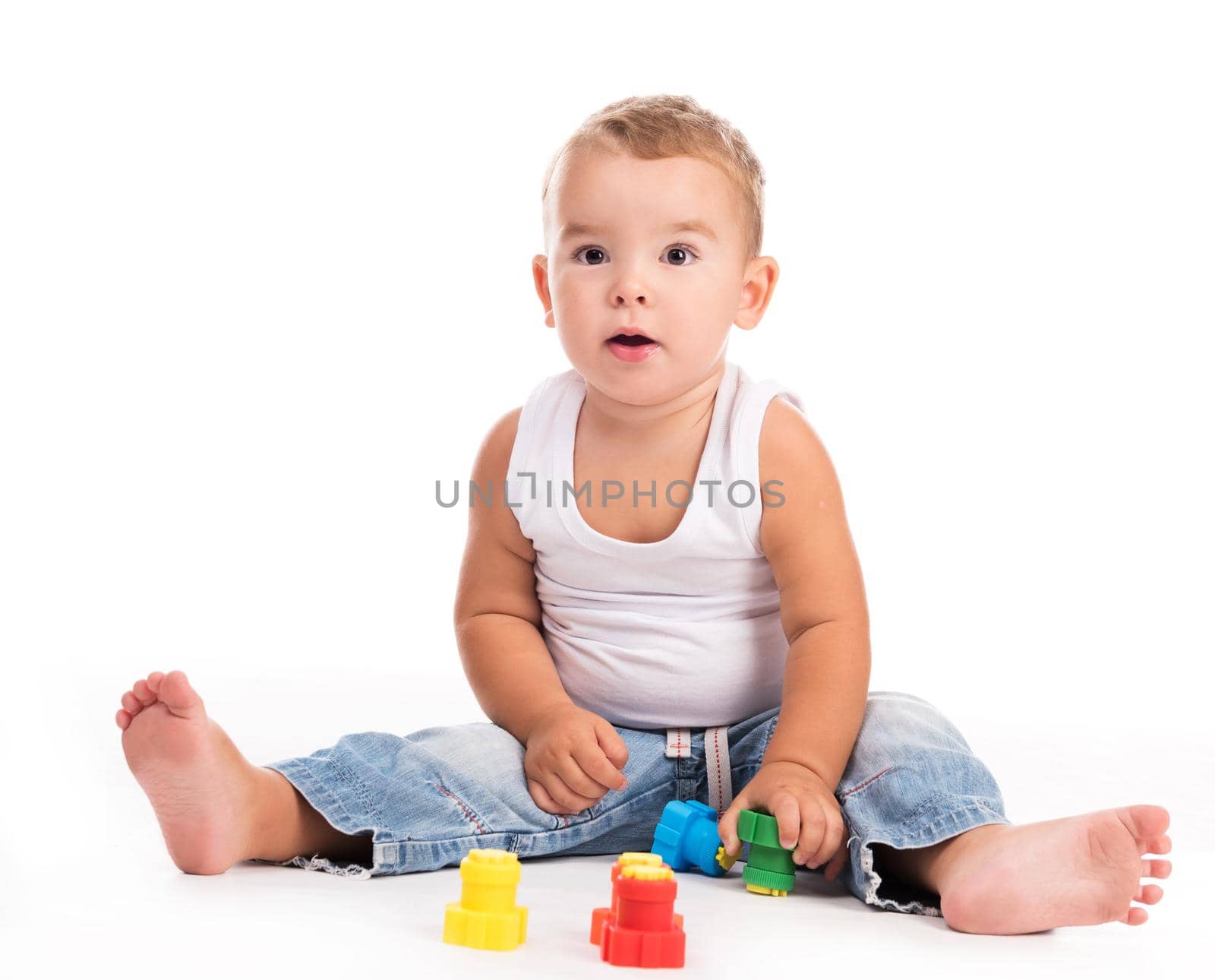 little boy playing with gouache isolated on white background