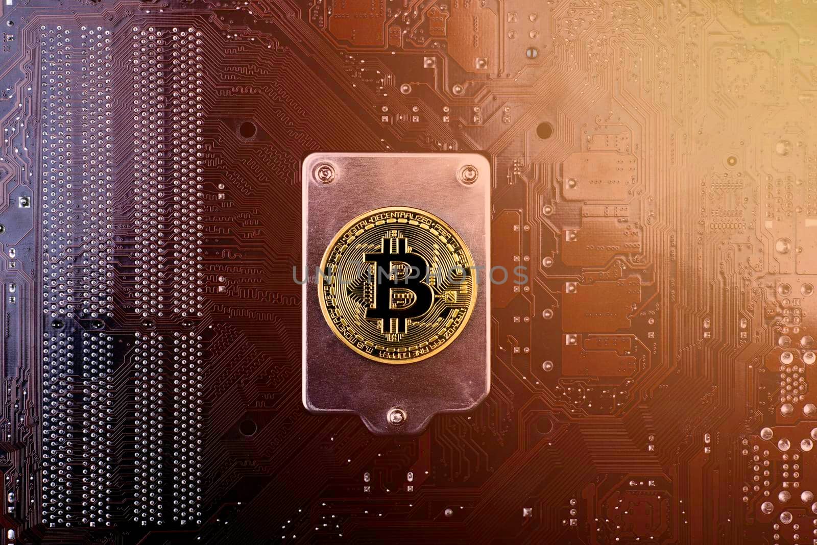 Gold Bitcoin on the back of the motherboard