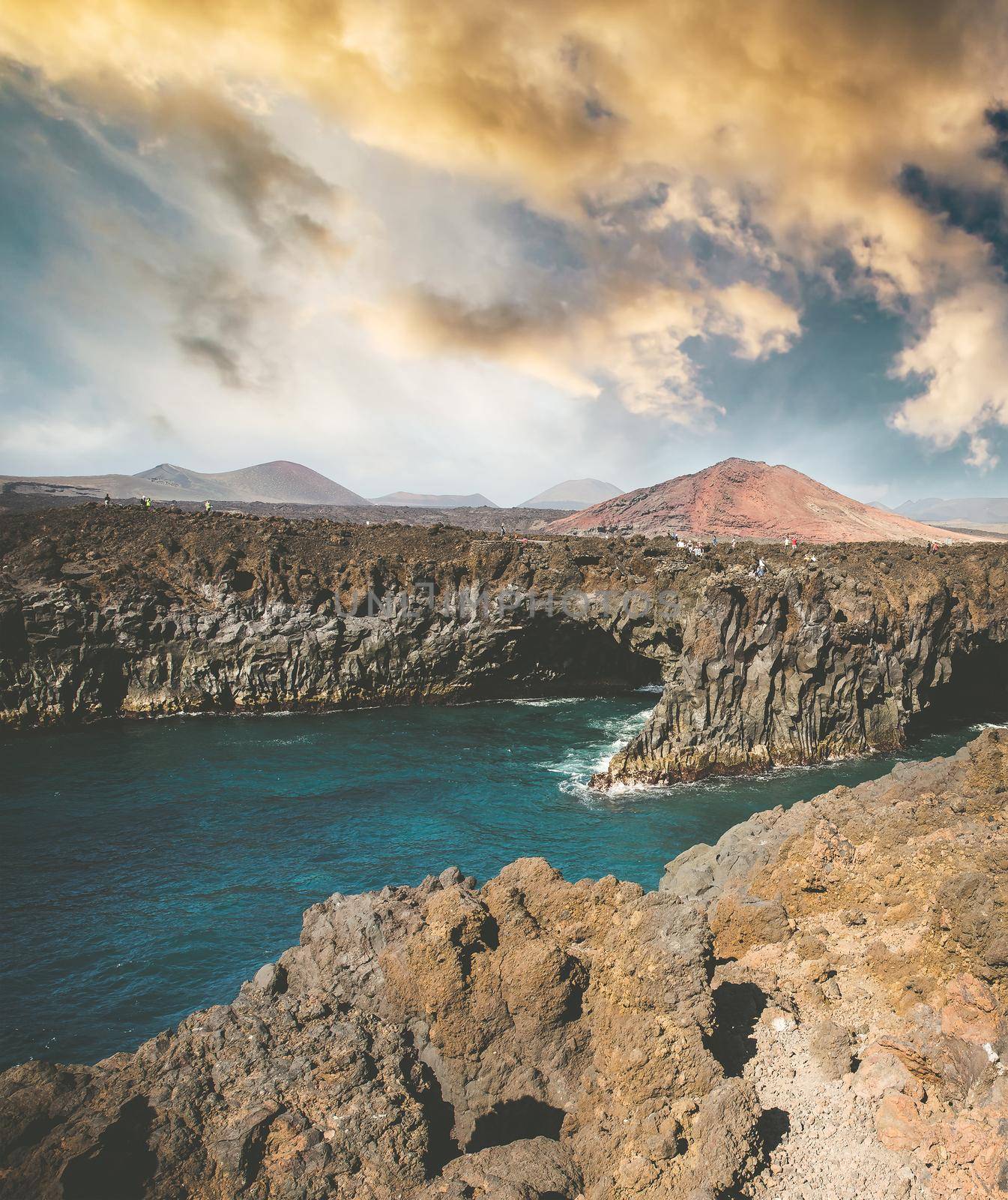 beautiful cliffs on the coast against sunsut sky