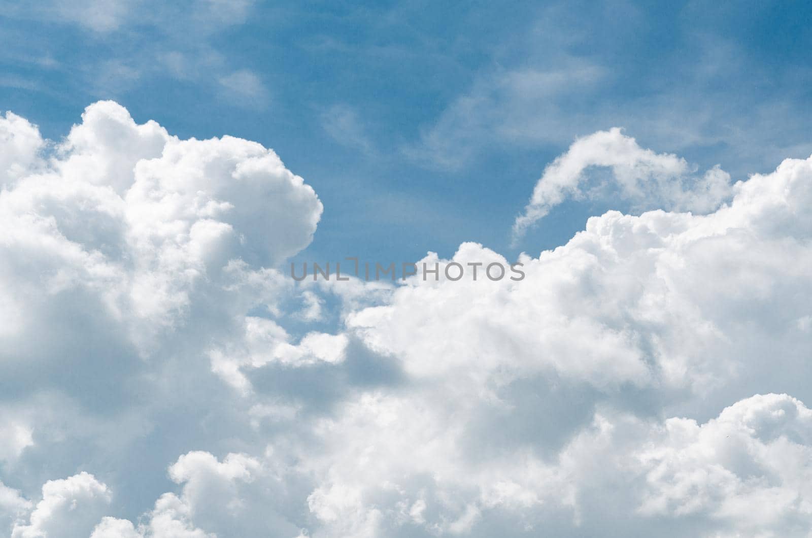 Incredibly wonderful lush cumulus clouds against a blue sky - Image