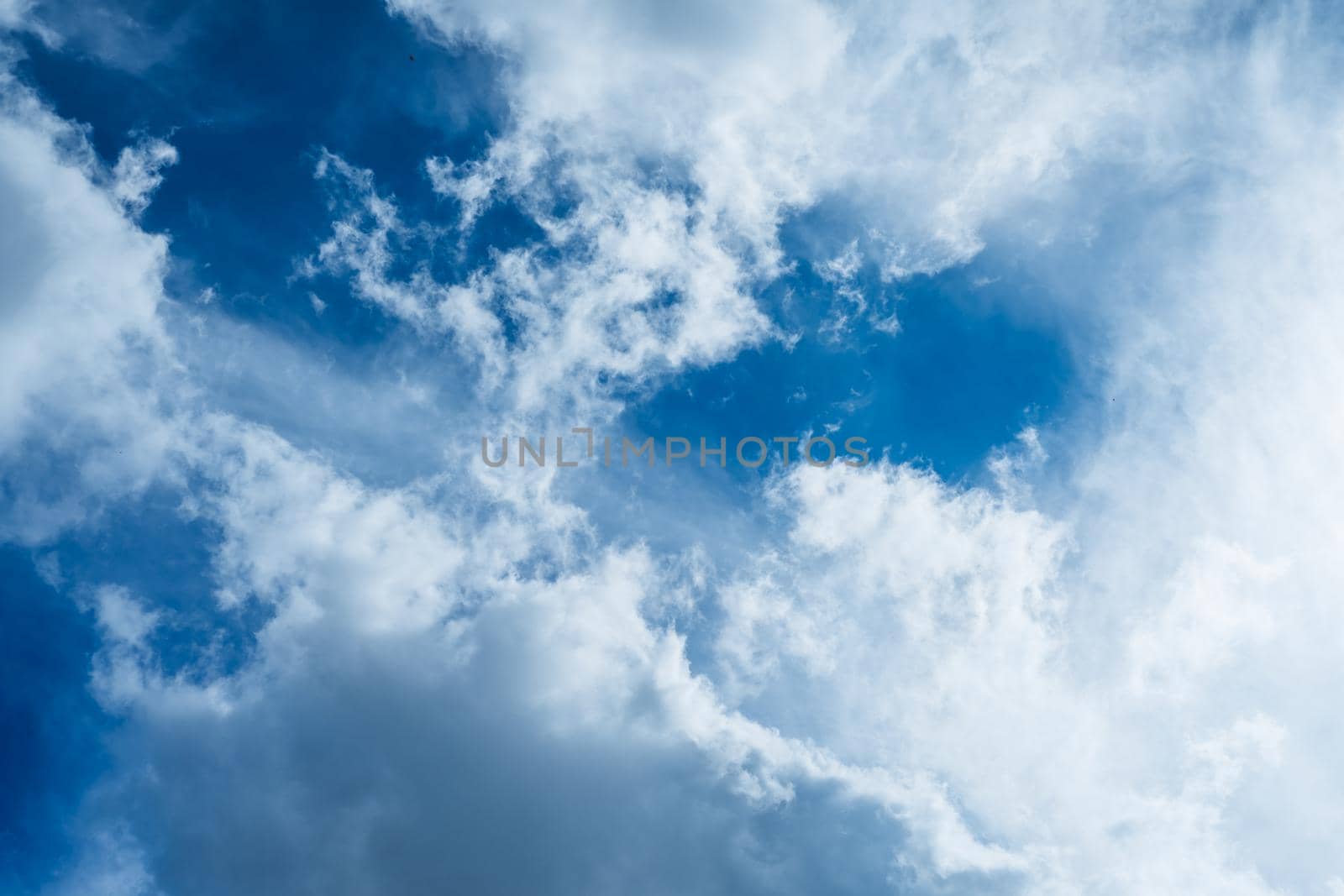 Incredibly beautiful clouds against a sunny blue sky. - Image
