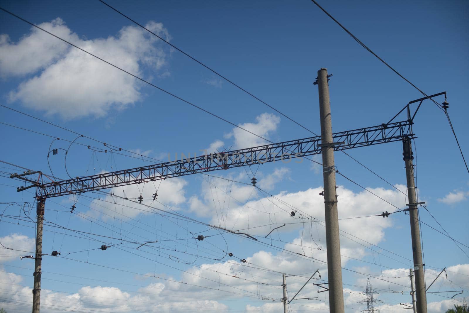 overhead power lines providing to electric trains - image