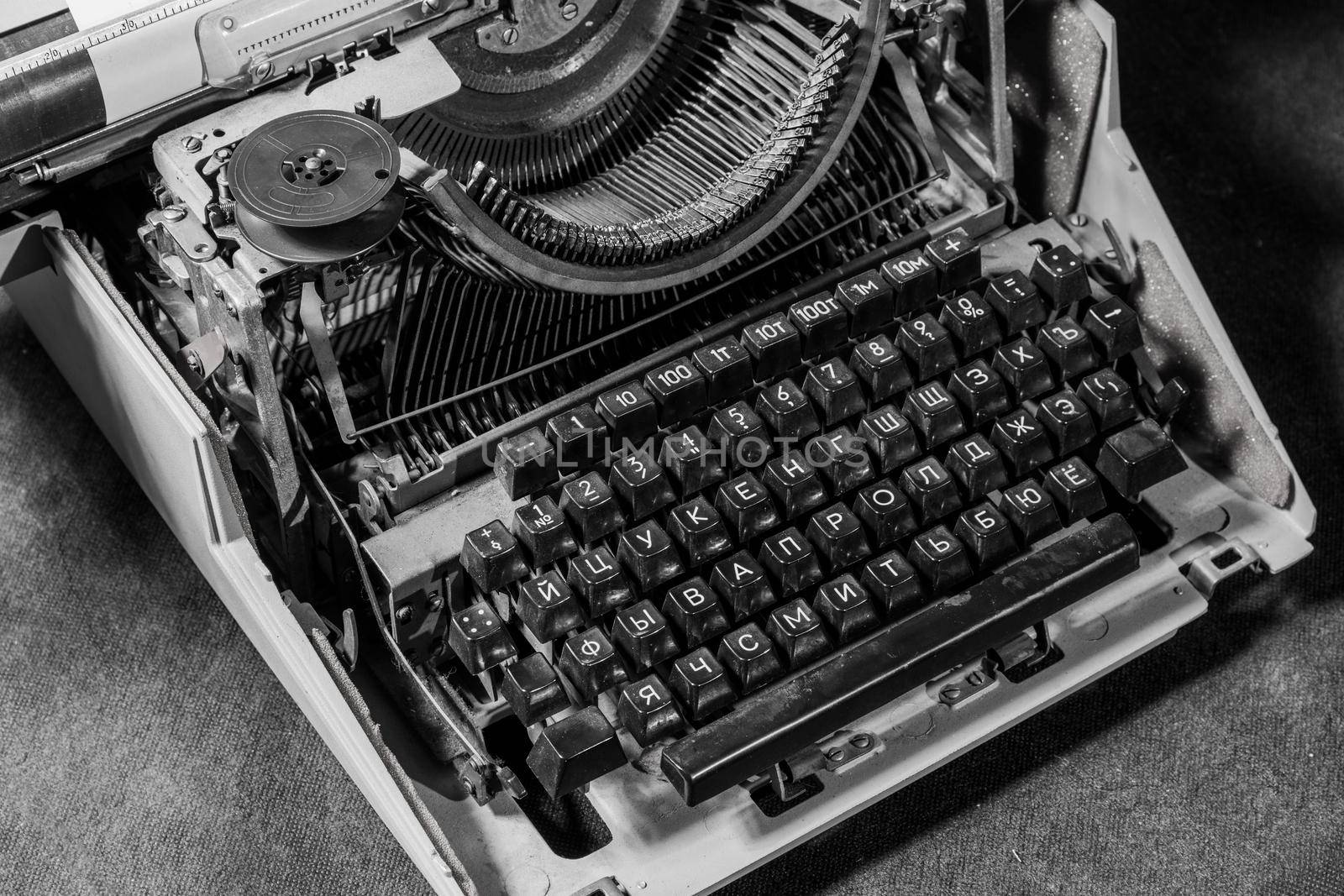 Retro styled image of an old typewriter on a table