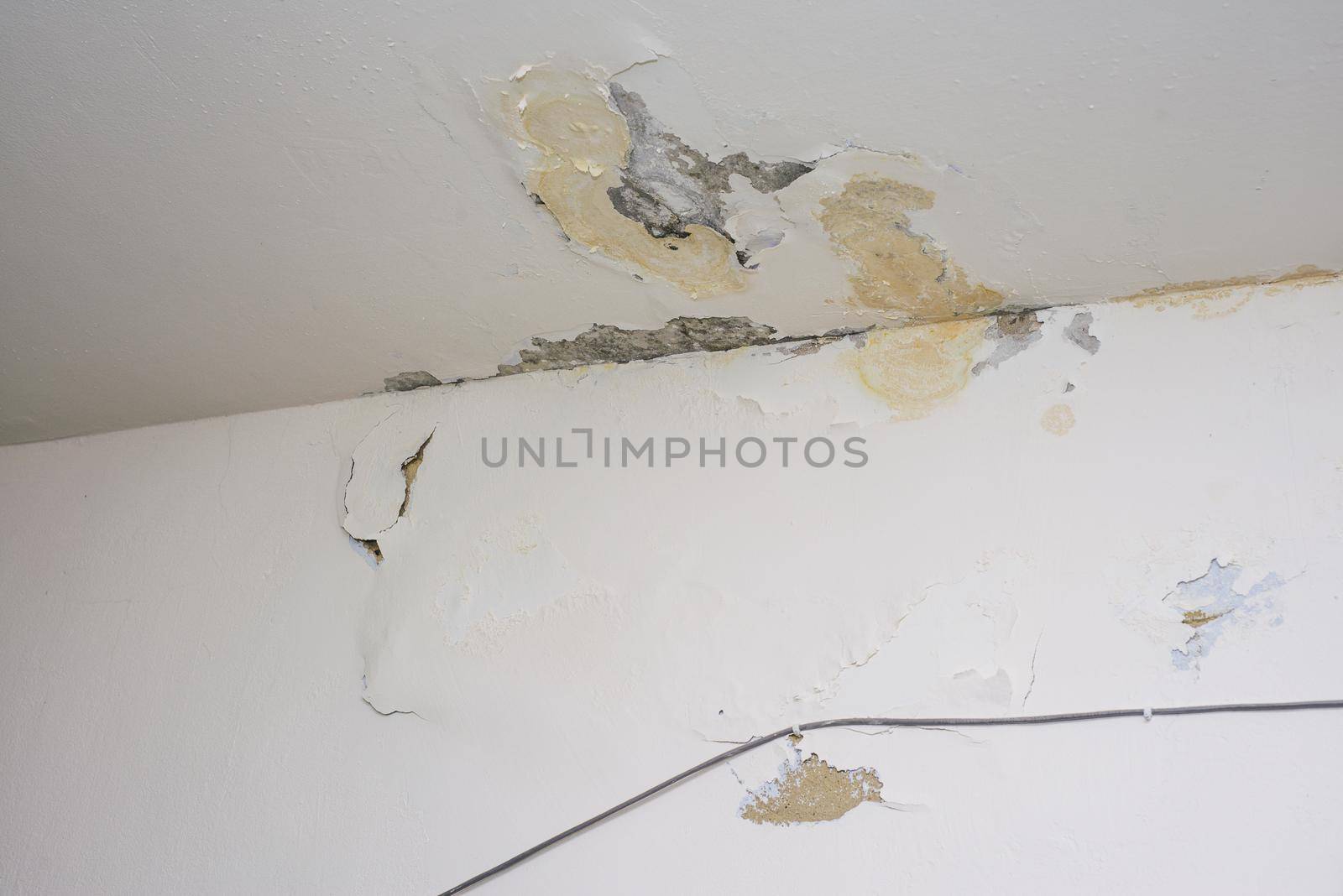 Damage ceiling from water pipelines leakage. Housing problem concept - image