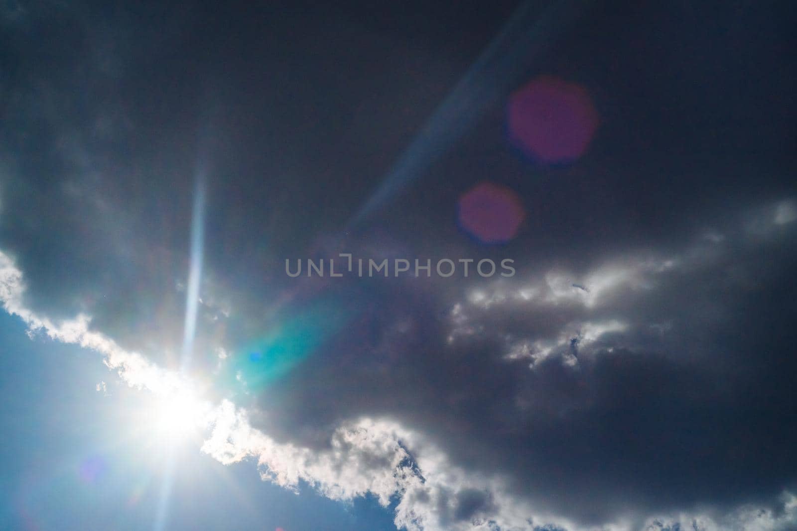 The sun shines bright in summer. Blue sky and clouds.- image