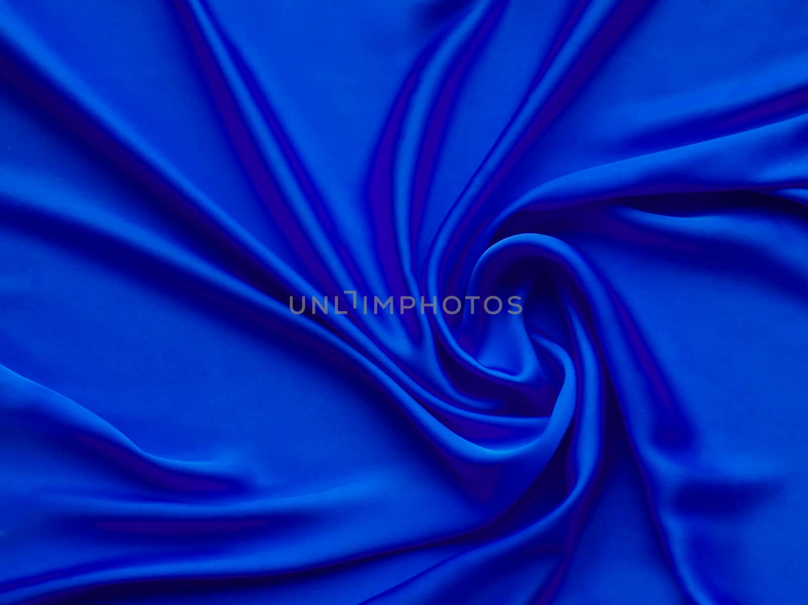 luxurious blue satin background close up for postcard or abstracted wallpaper
