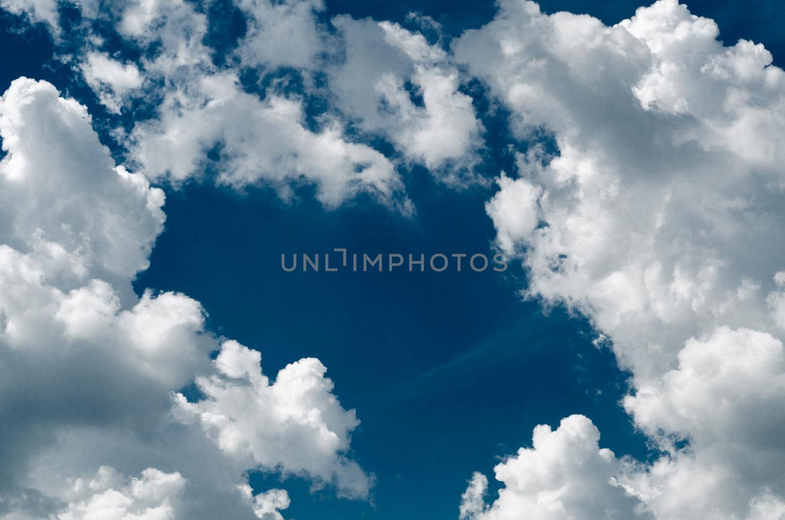 Incredibly wonderful lush cumulus clouds against a blue sky - Image