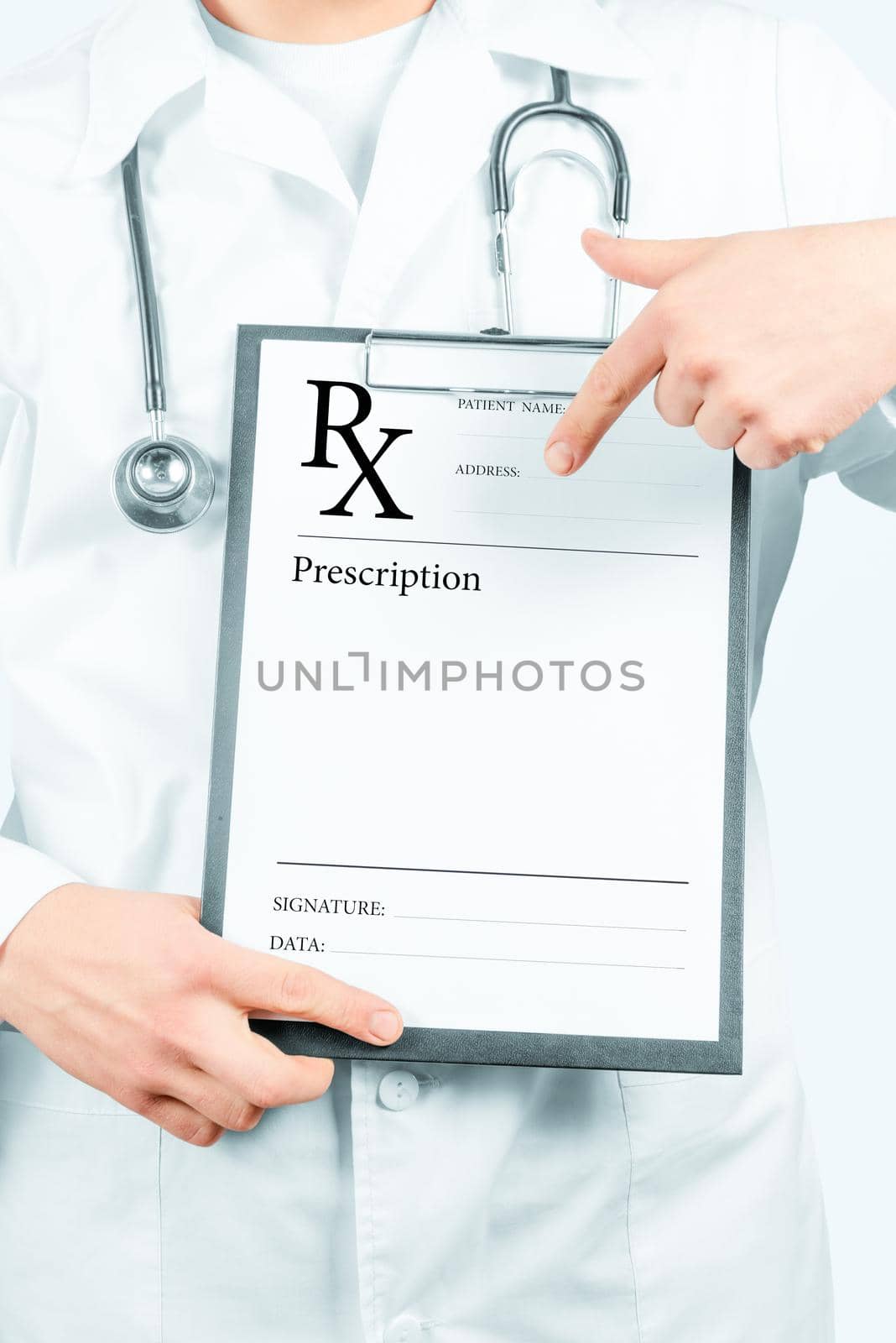 Doctor pointing on clipboard with prescription paper by alexAleksei