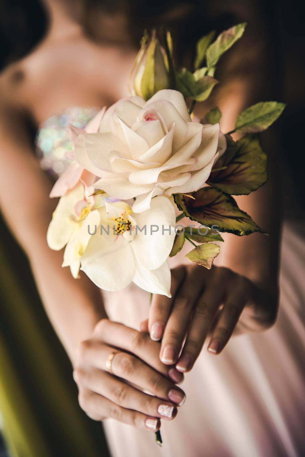 Bride holding wedding flowers bouquet by zartarn