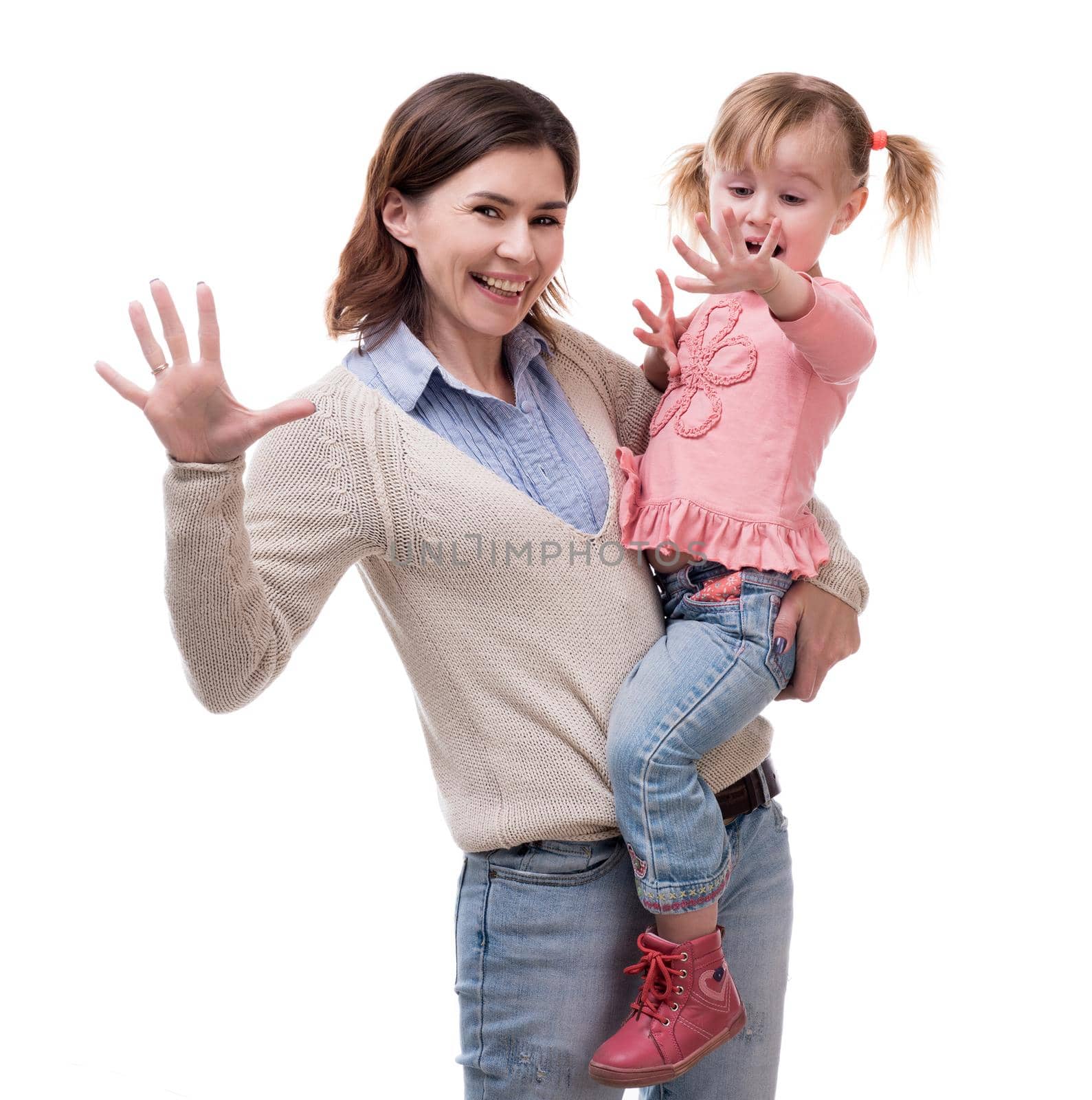 mother with daughter in her arms with palms up isolated on white background