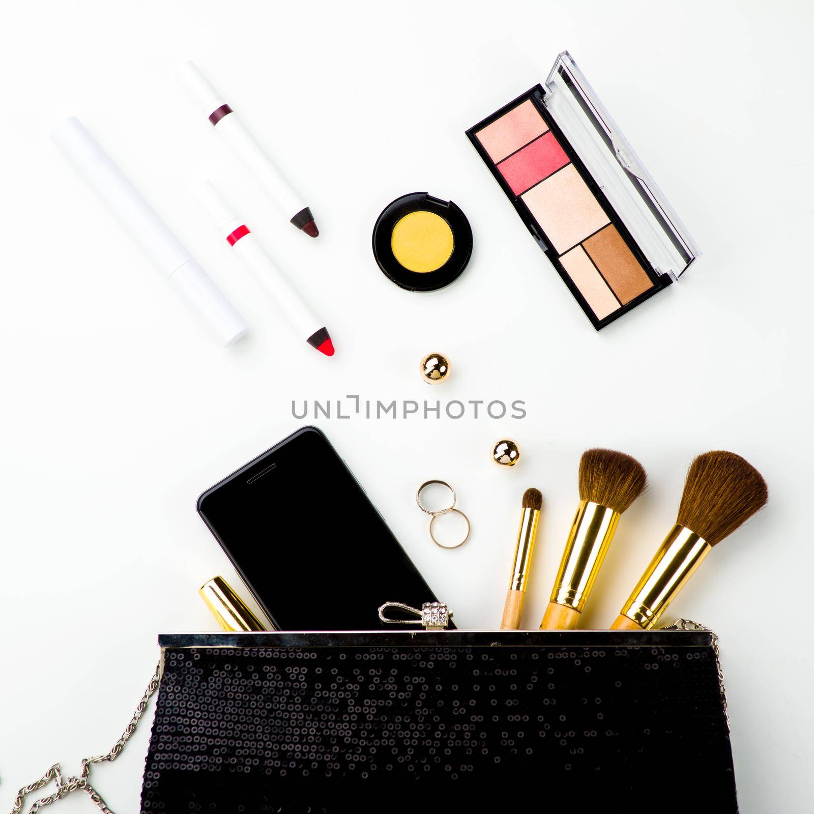 make up bag with cosmetics and brushes isolated on white background - image