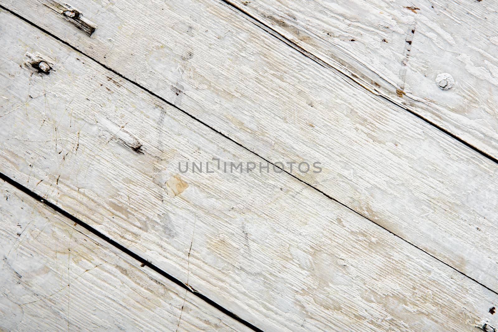 Old wooden board painted white.diagonal