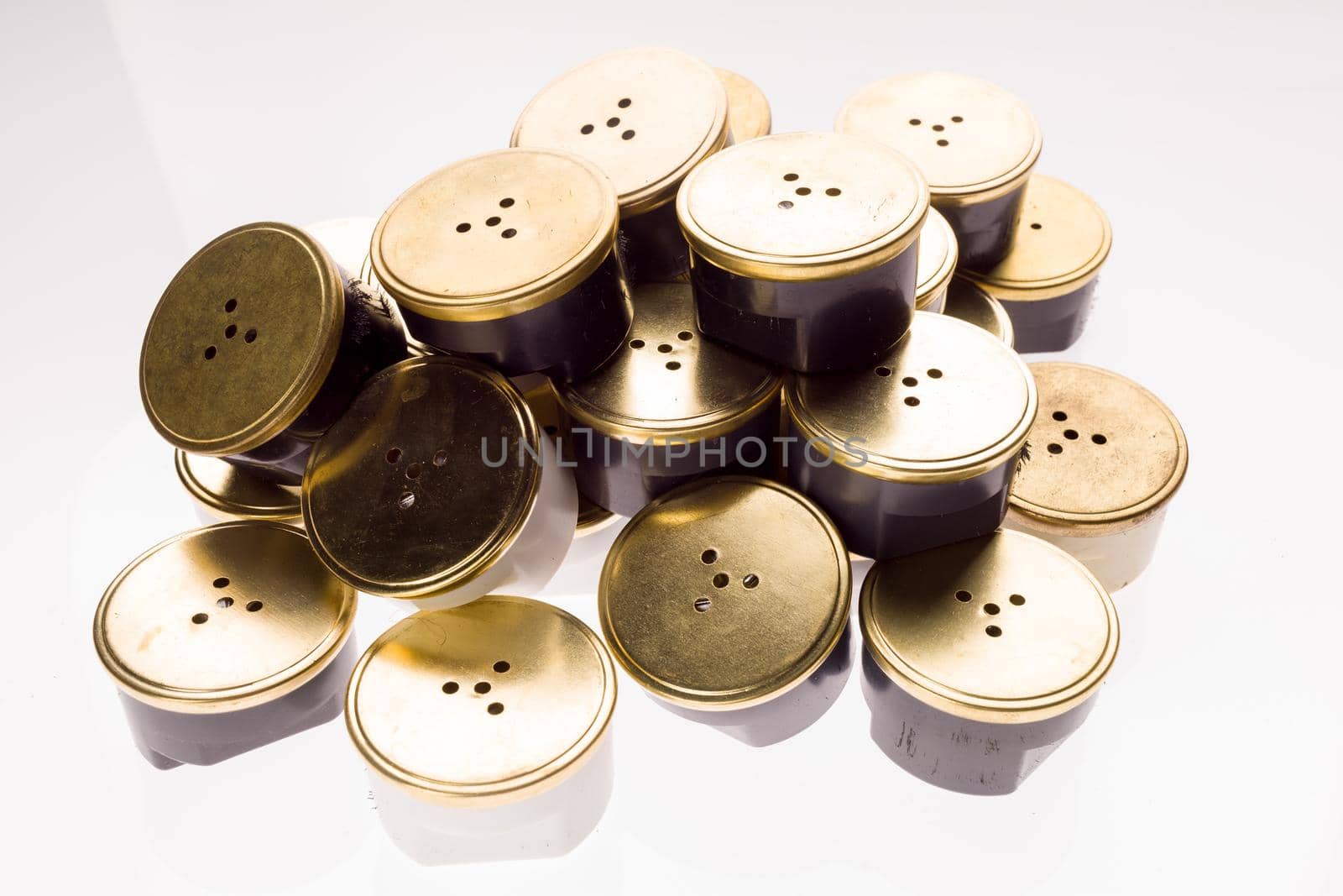Speakers or microphones from vintage phones on a white background. - image