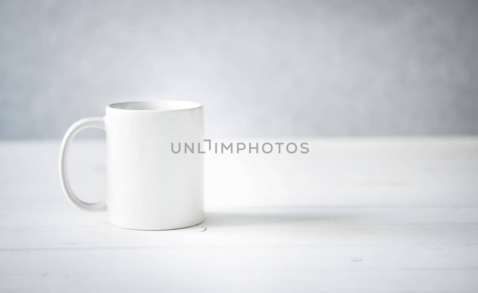 clean white cup on a table close up