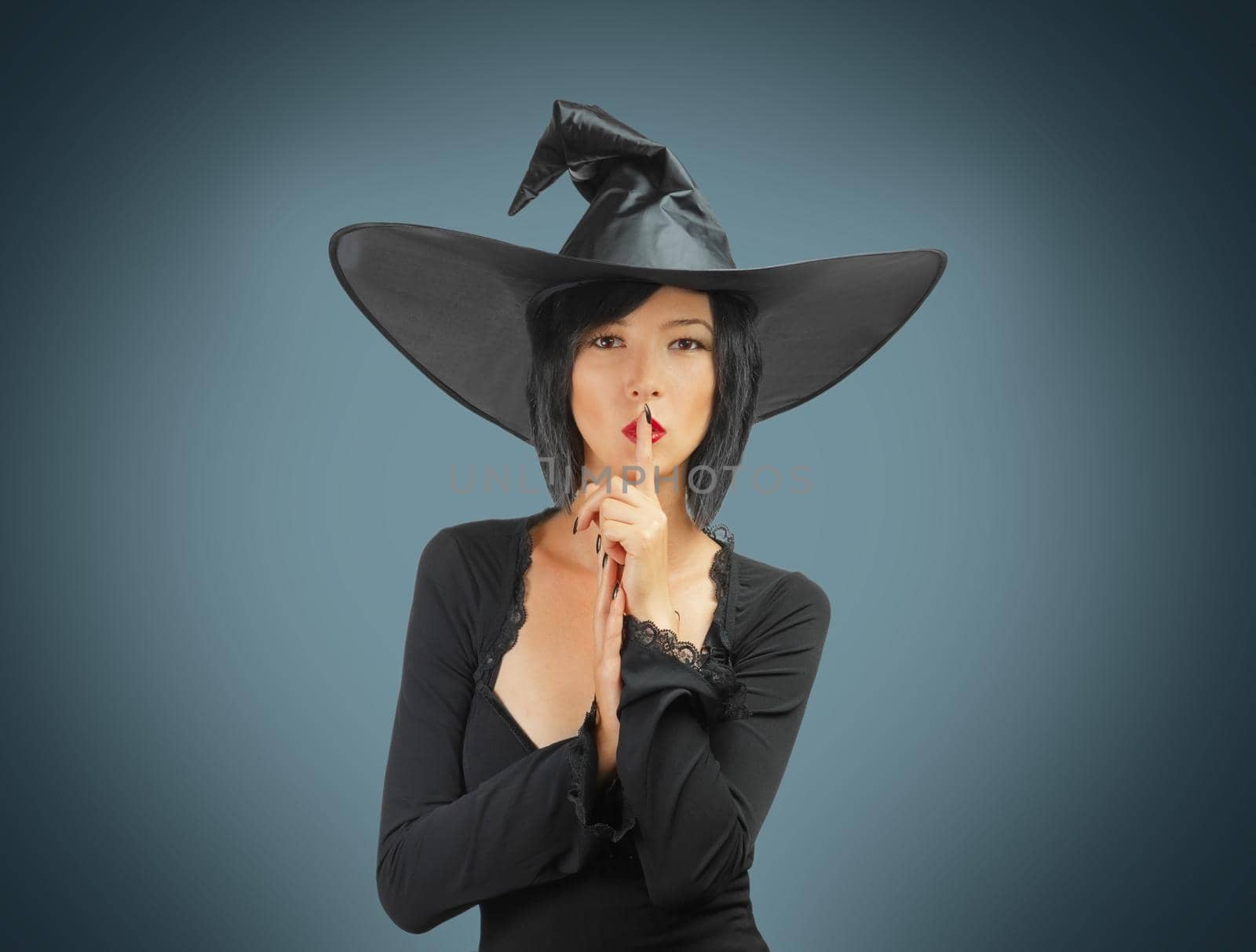 Halloween witch makes silence gesture by alexAleksei