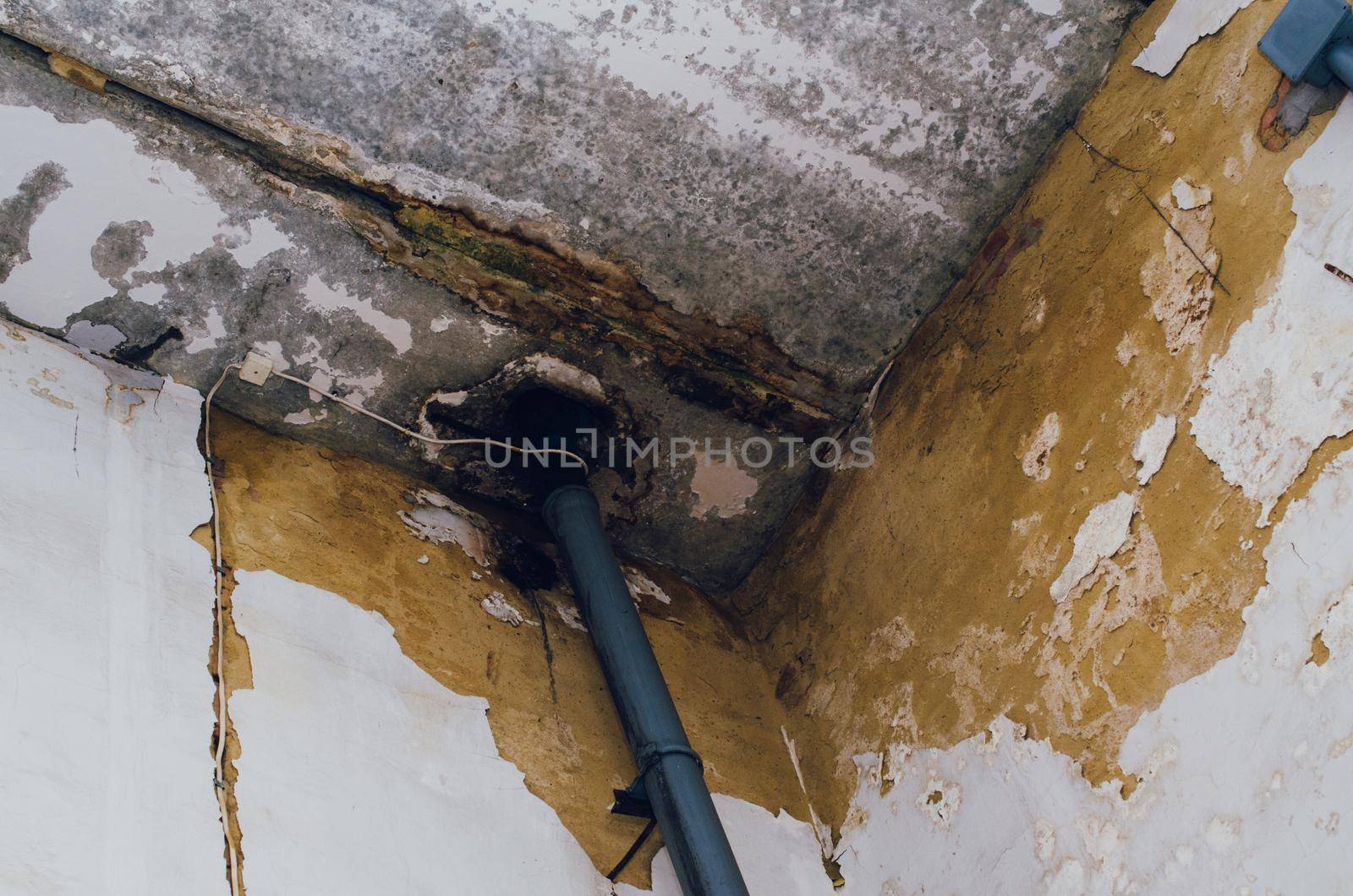 Big wet spots and cracks on the ceiling of the domestic house room after heavy rain and lot of water - Image