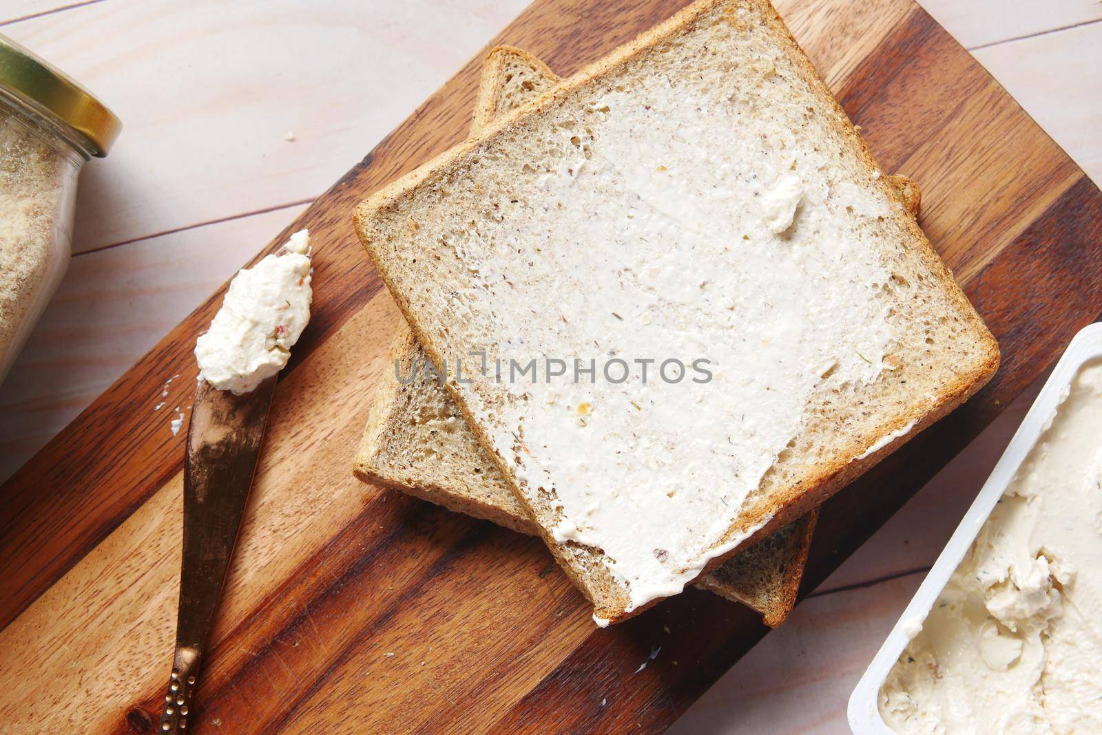 low fact cheese cream in a container on table