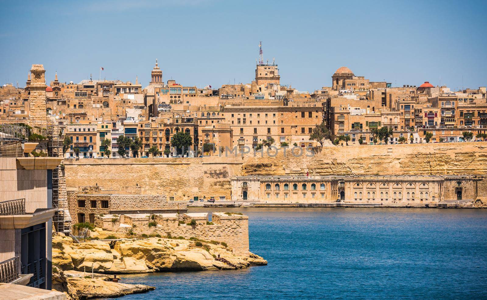 picturesque view on Valletta coastal architecture from the sea in Malta