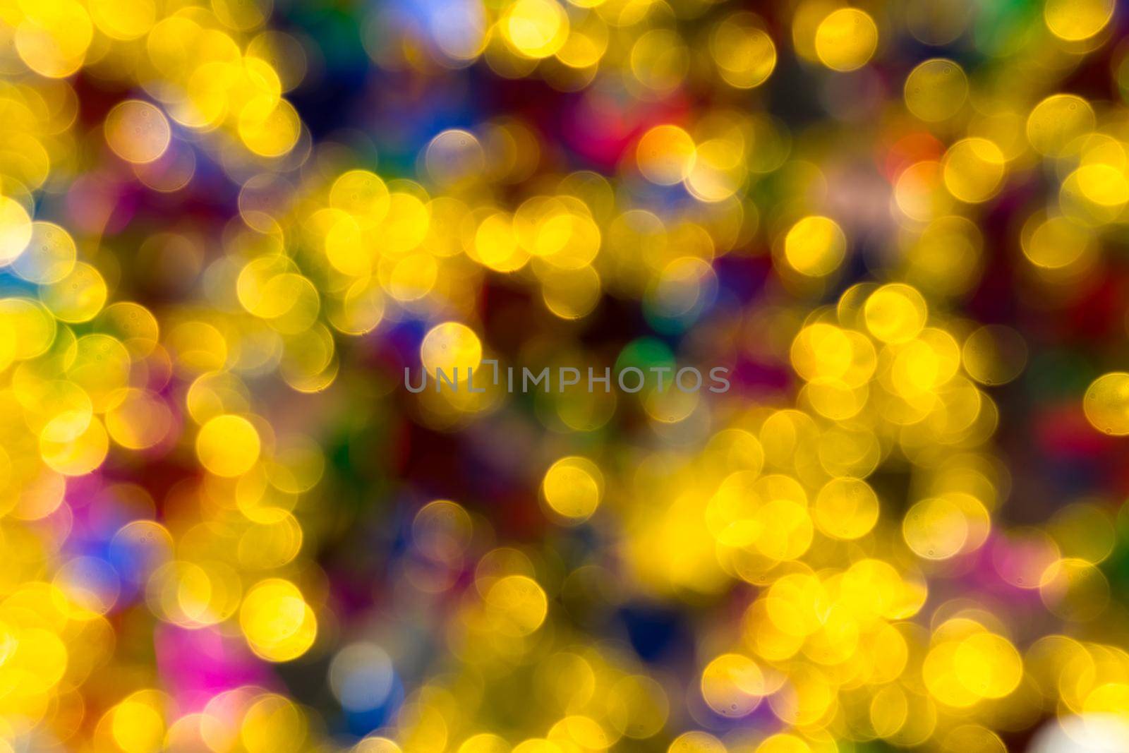 Abstract golden color lights chrismas background. de-focused - image