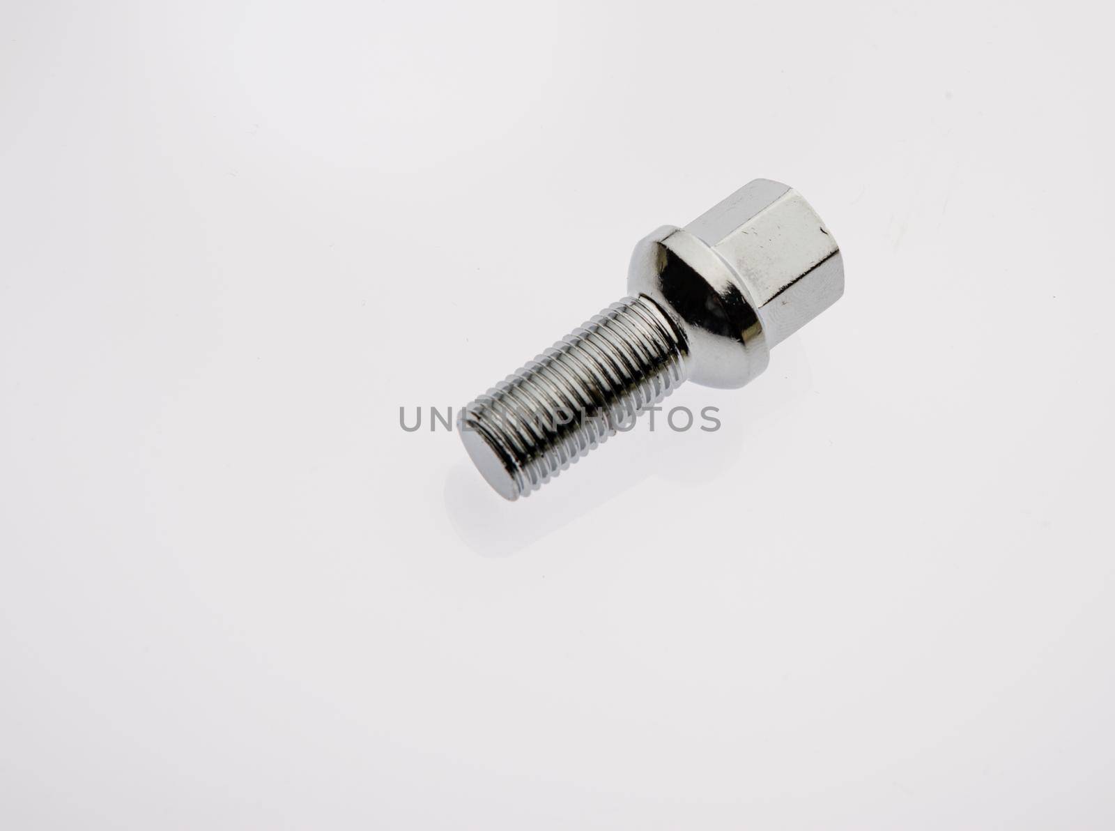 One car wheel bolts isolated on white background with copyspase - Image