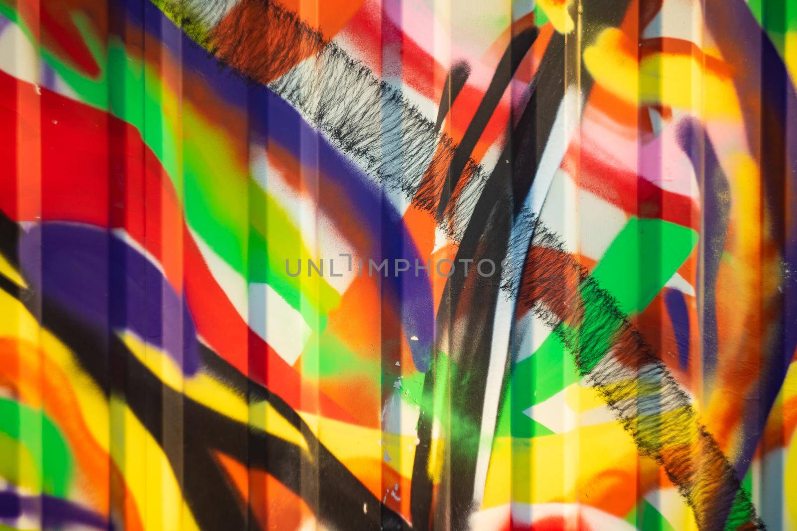 Unfocused abstract pattern on an iron fence - image