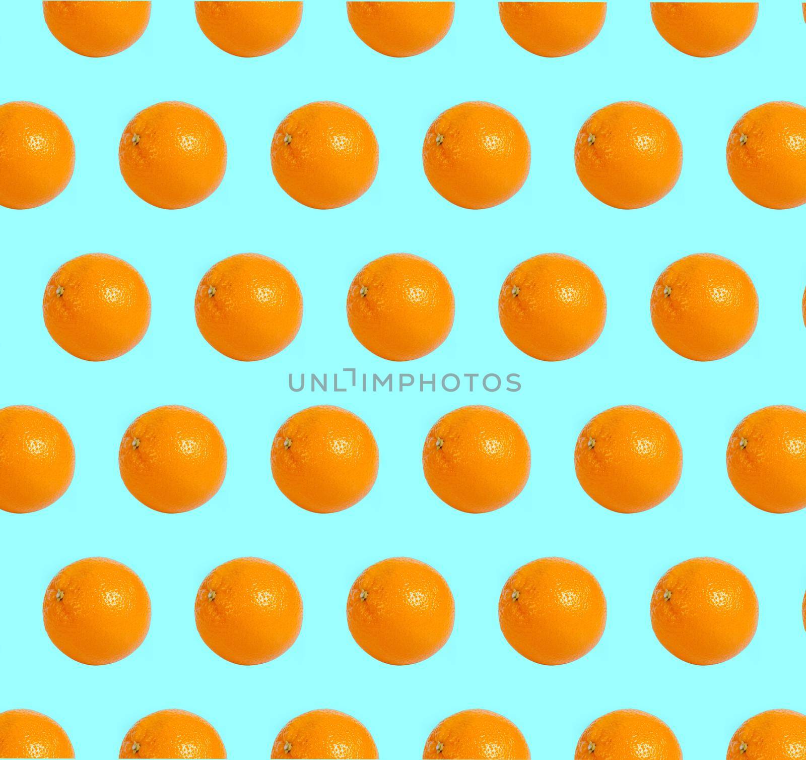Colorful fruit pattern of fresh orange slices on background. From top view