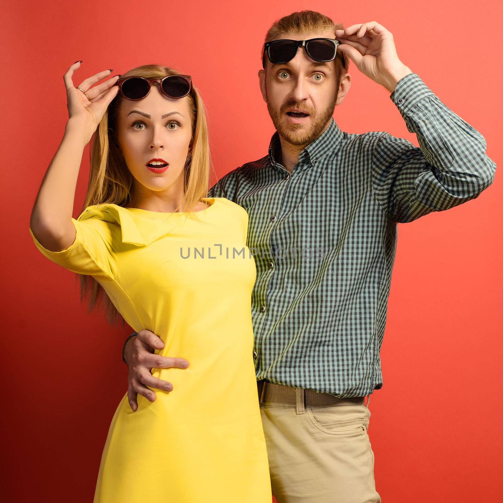man and beautiful slender young woman in a yellow dress with glasses by zartarn