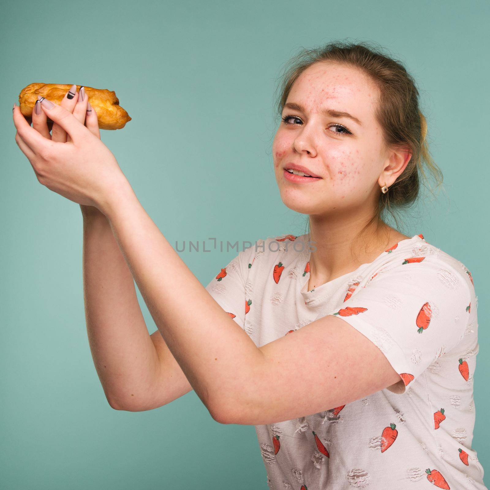 Portrait of pimply teen girl wants to eat eclair cake by zartarn