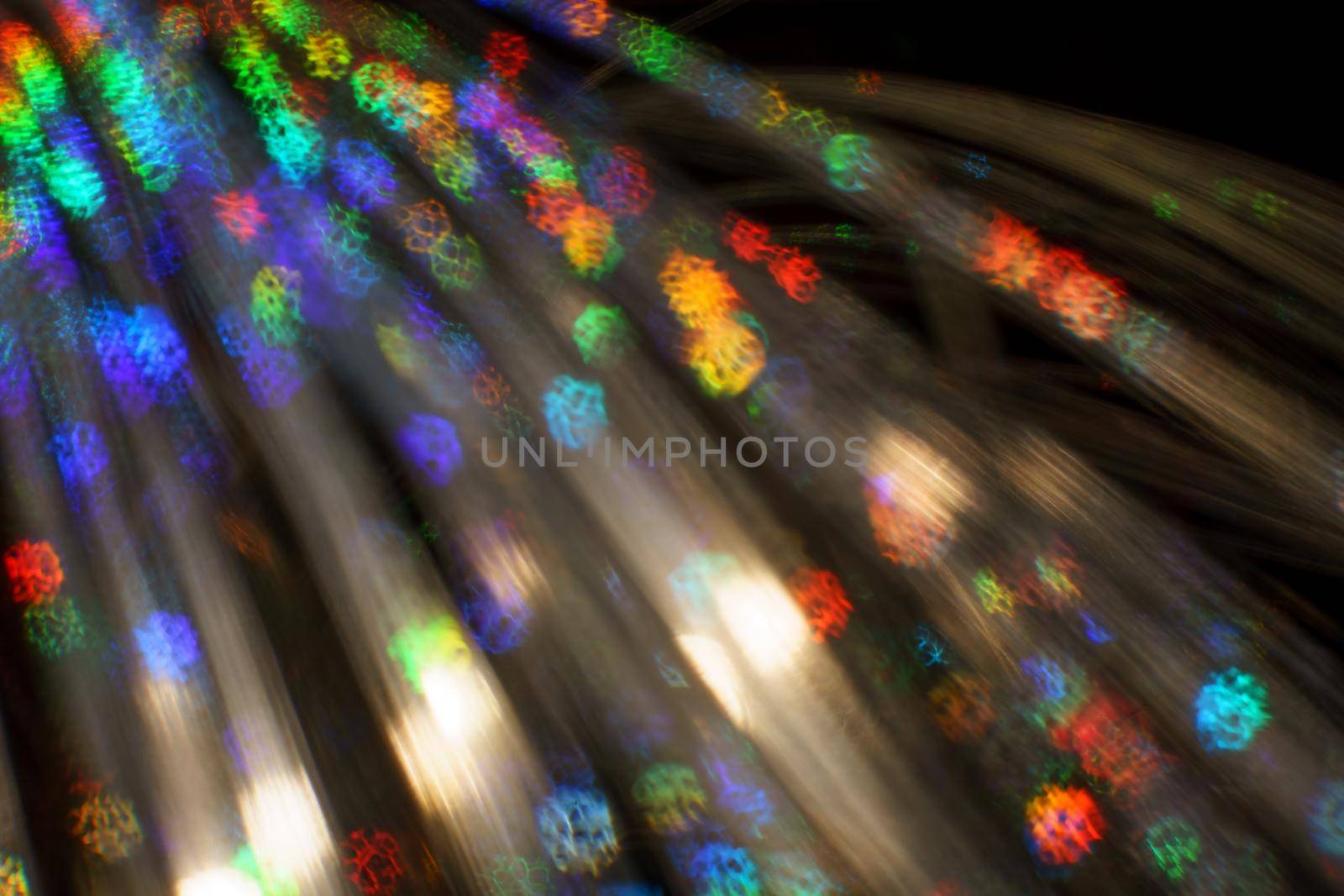 Christmas background. Festive abstract background with bokeh defocused lights and stars.