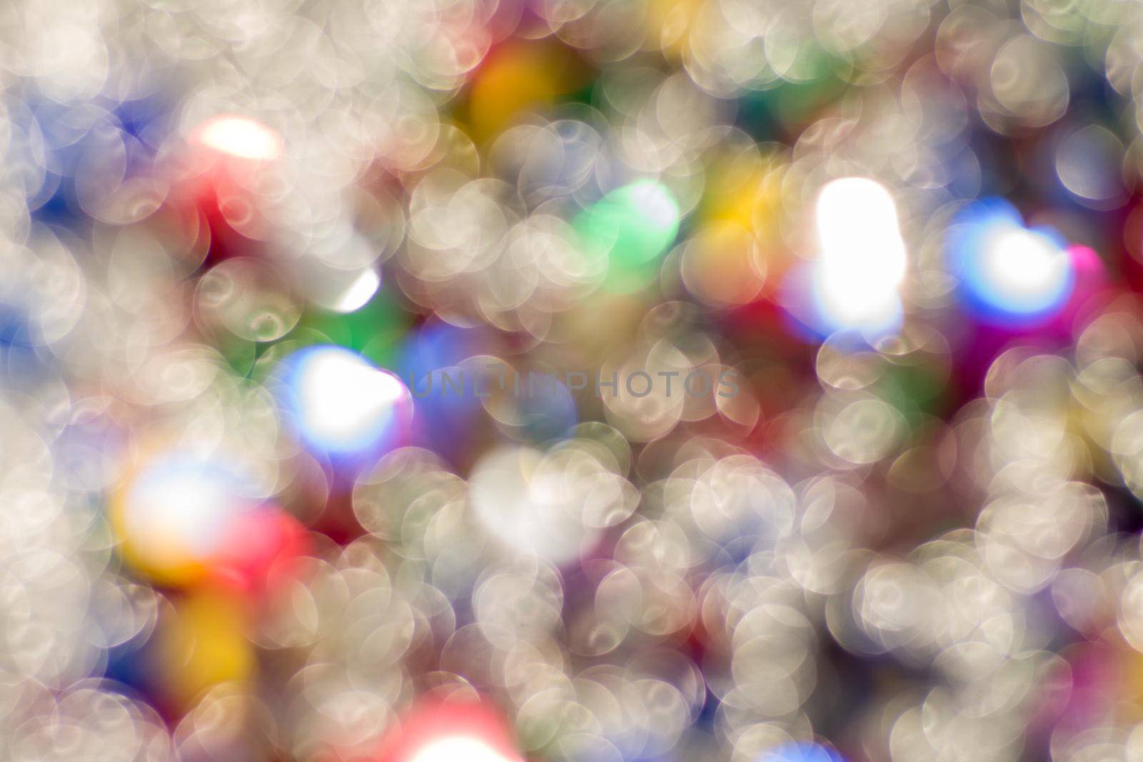 Abstract glitter color lights chrismas background. de-focused - image