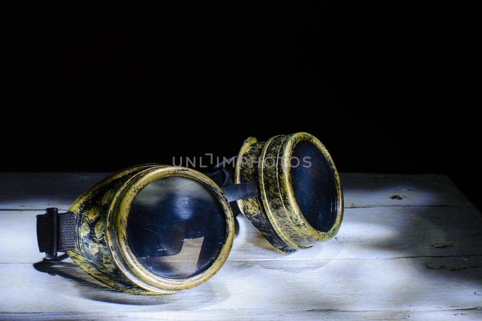 Steampunk glasses metal collage. light brush