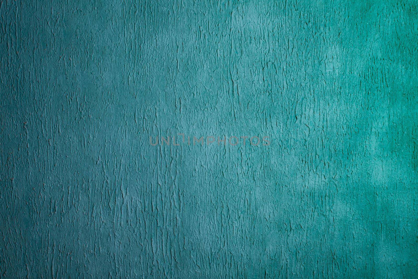 Beautiful Abstract Grunge Decorative Light Blue Cyan Painted Stucco Wall Texture. Handmade Rough Winter Christmas Paper Wide Background With Copy Space