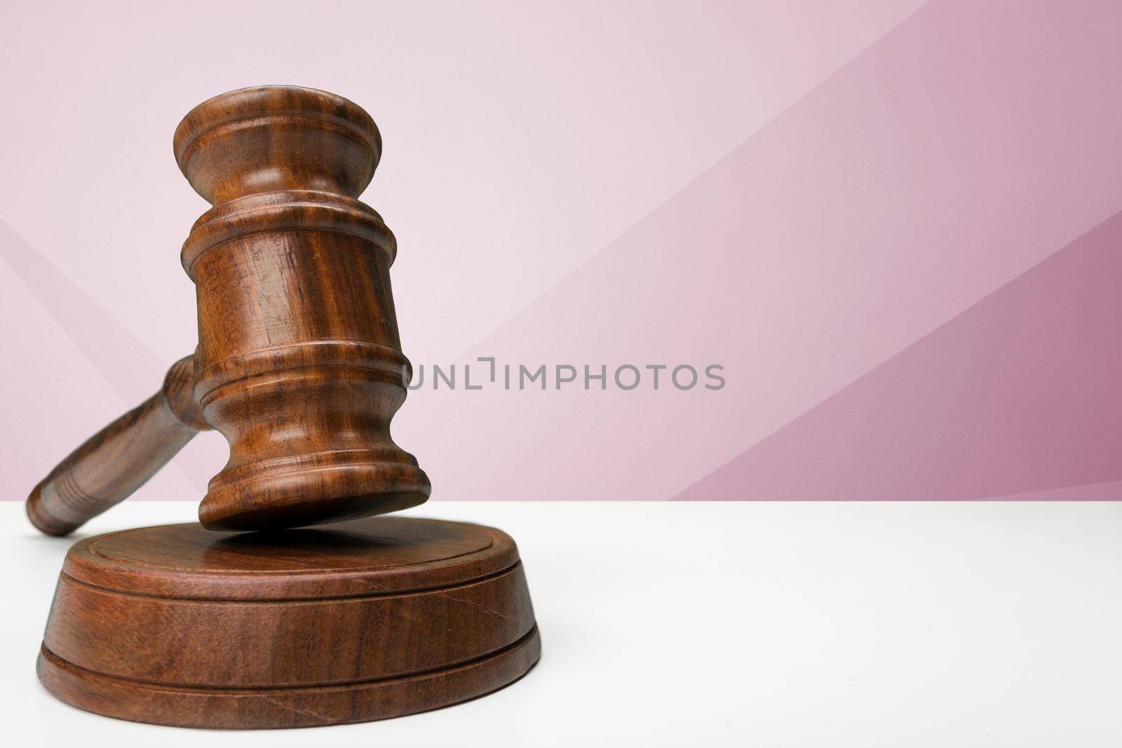 Wooden gavel on table close up. Justice concept