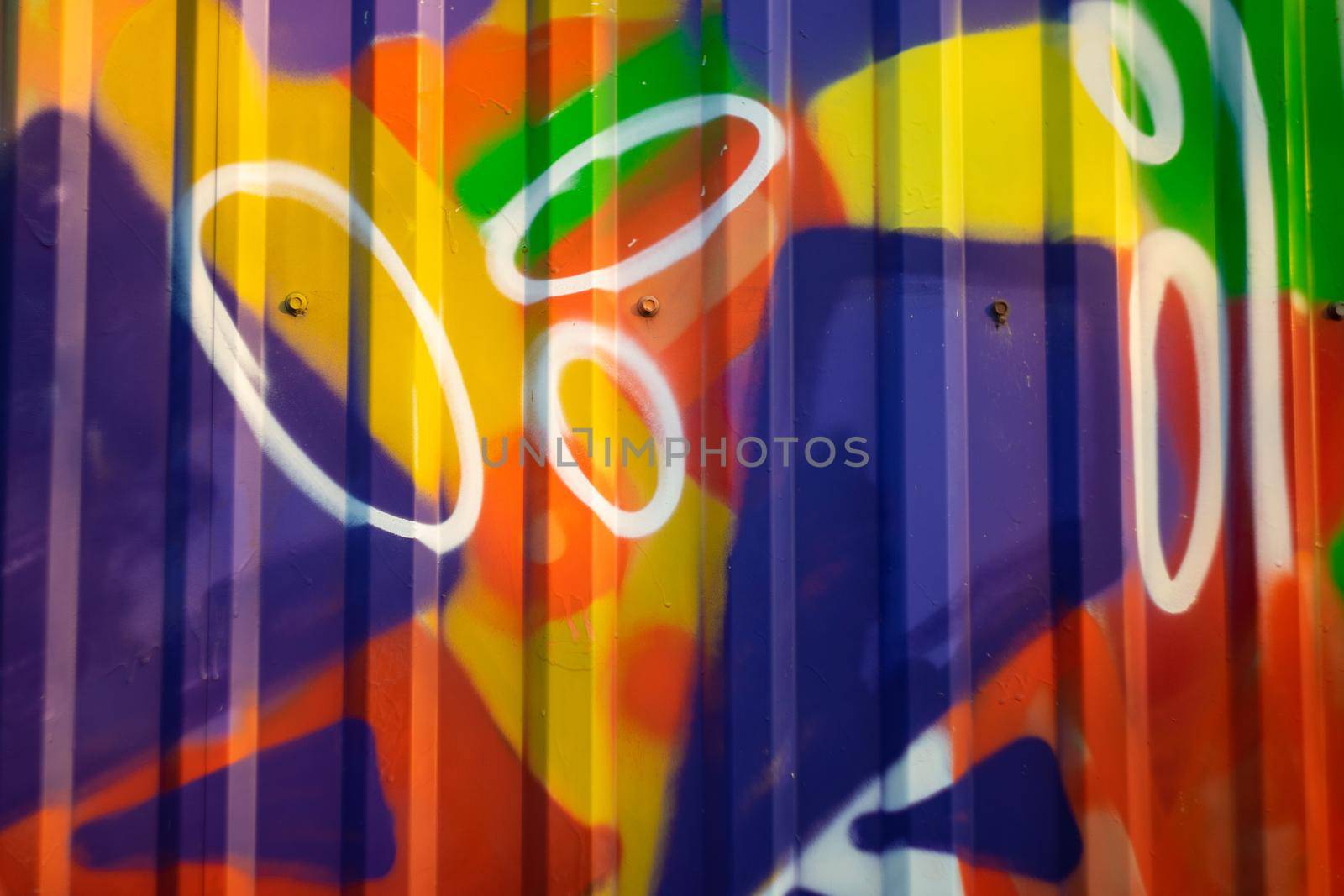 Unfocused abstract pattern on an iron fence - image