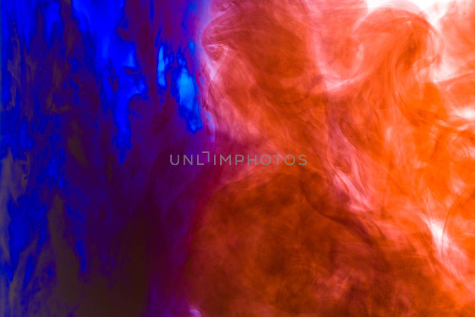 Cloud of ink in water isolated on white. Color of the year 2020. - image
