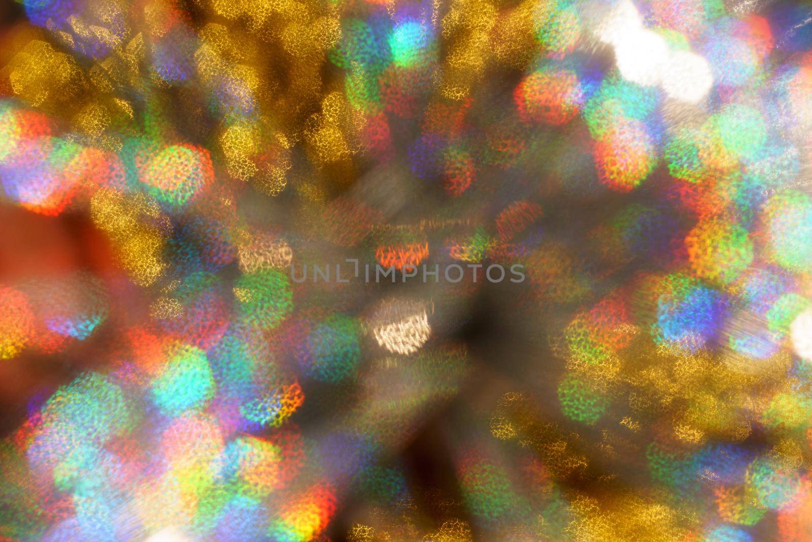 Christmas background. Festive abstract background with bokeh defocused lights and stars.