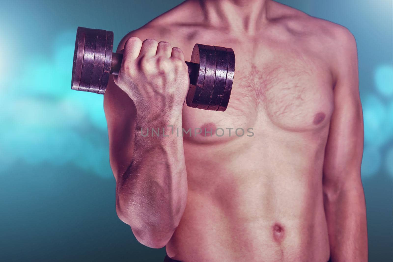 Muscular man lifting dumbbell by alexAleksei