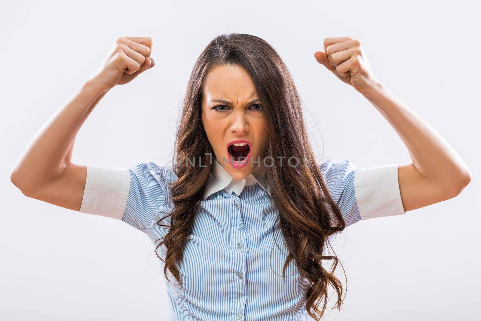 Angry businesswoman shouting.