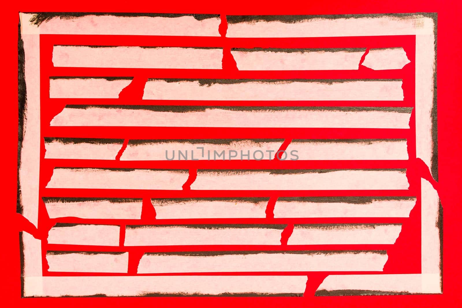 close up of an adhesive tape on red background.
