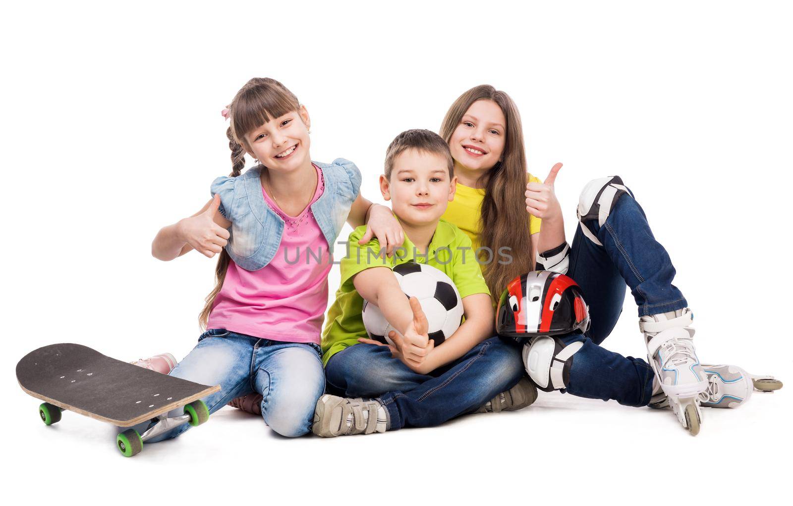 laughing schoolchildren with sport equipment on the floor isolated on white background