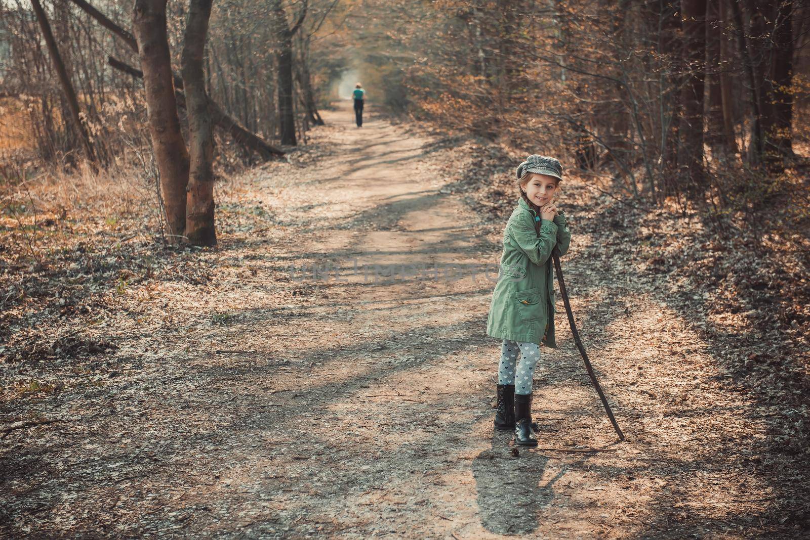 little girl goes through the woods, photo in vintage stylev
