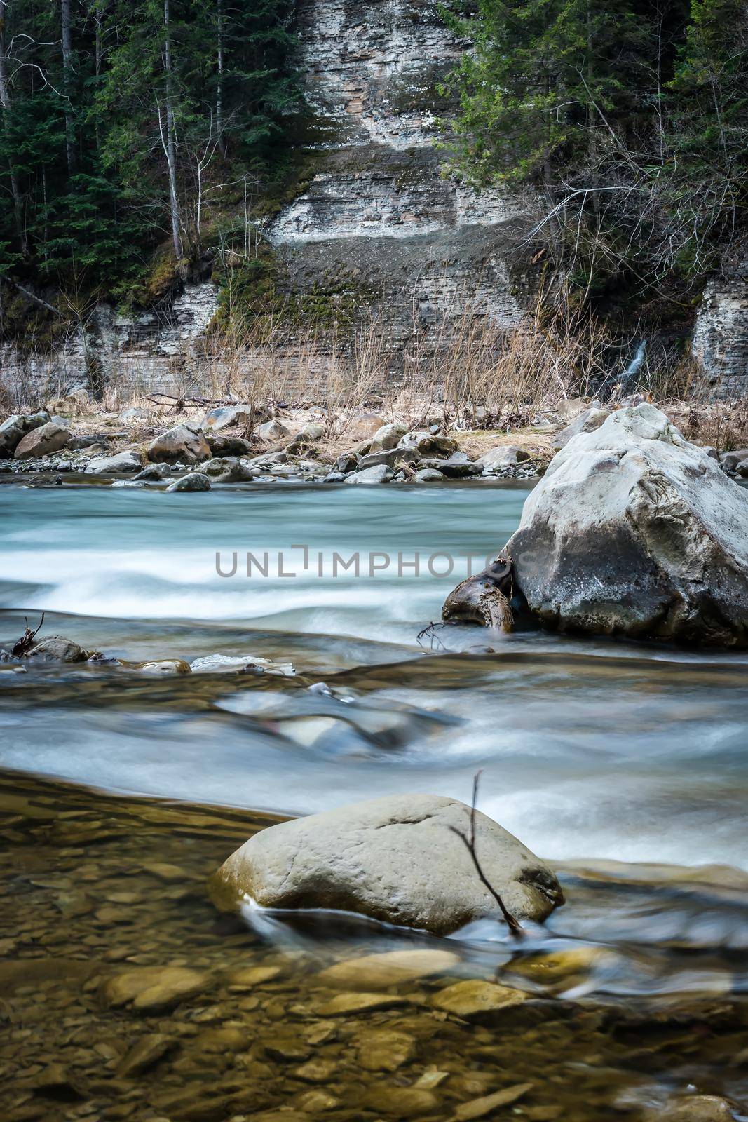 beautiful landscape with river flowing in mountains