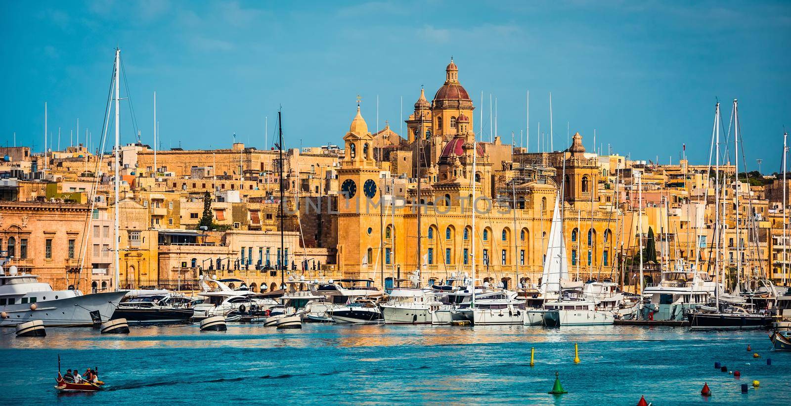 beautiful view on Birgu and the harbour with colorful boats in Malta