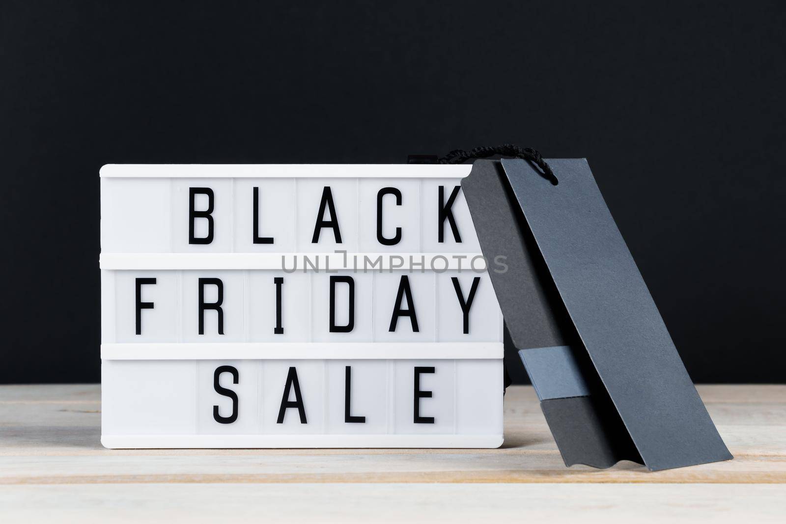 Black Friday sale. Label and lightbox on dark background. by Statuska